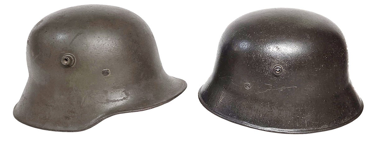 A side-by-side comparison of a German Model 1918 helmet (left) with the Model 1918 “full visor” variant made for the Ottoman Empire.