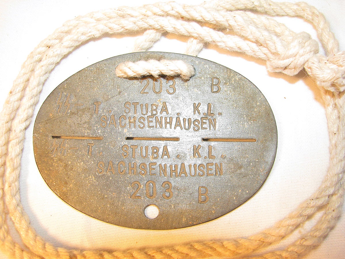 Another “Konzentrationlager” dog tag from the Sachsenhausen camp. Needless to say, these were rapidly discarded by the wearers as the Allies discovered the mass murders that had taken place during the SS’ “Final Solution”.