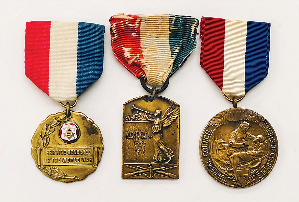 The “O of IA” WWI medal is unique and shows no maker mark. The Fraternal Patriotic Americans shows a Lady of Victory above naval and infantry symbols. The Supreme Council of K of C shows a Council worker aiding a soldier in a “K of C Hut”.