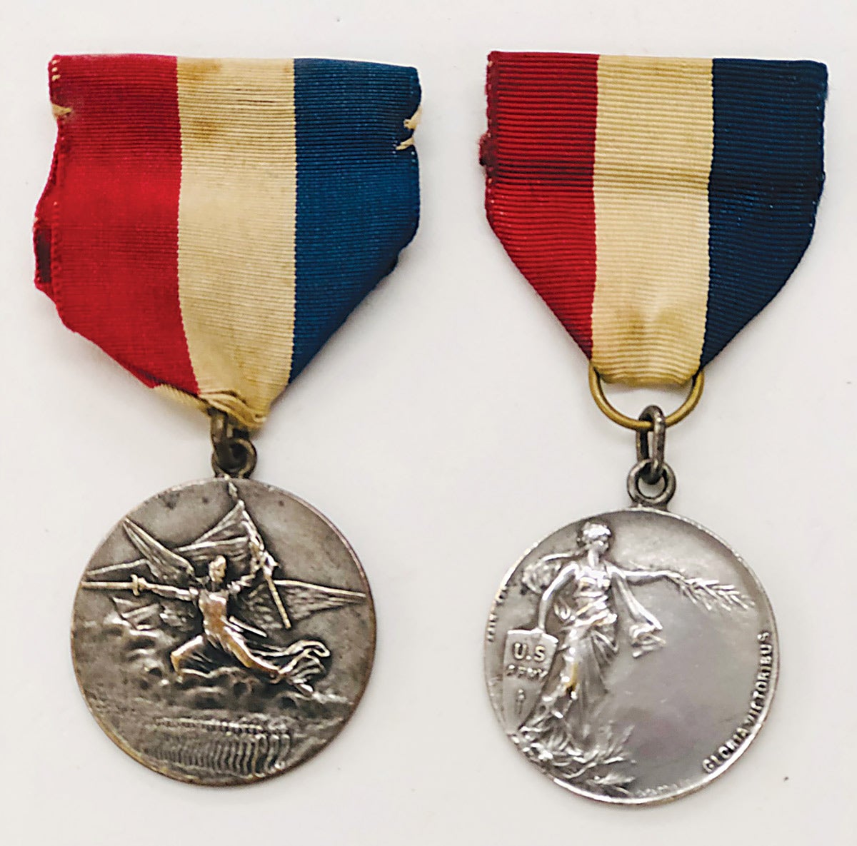 The Memorial U.S. Army and Navy WWI issue and In Memory of my Service in France WWI medal.