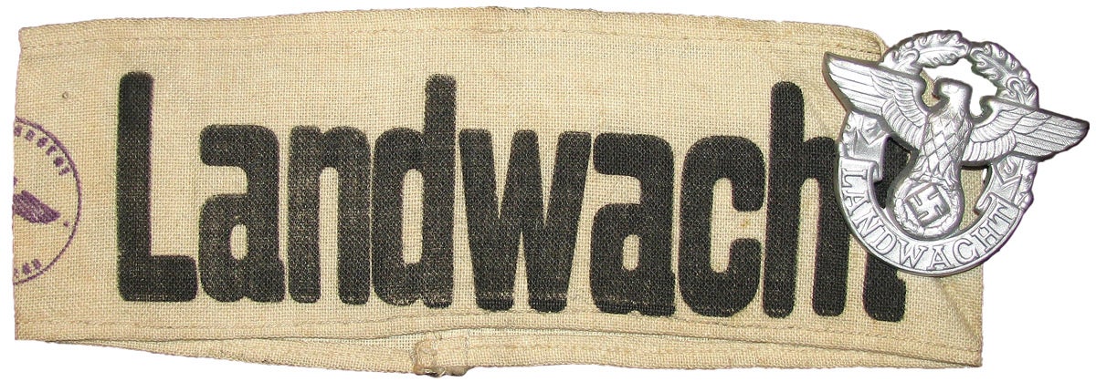 A Landwacht armband and cap insignia used by rural police auxiliaries who were often trained by the Wehrmannshaft. In addition, auxiliaries for the urban police, flak gunneries, Luftschutz and custom officials were also sent through the SAW training programs