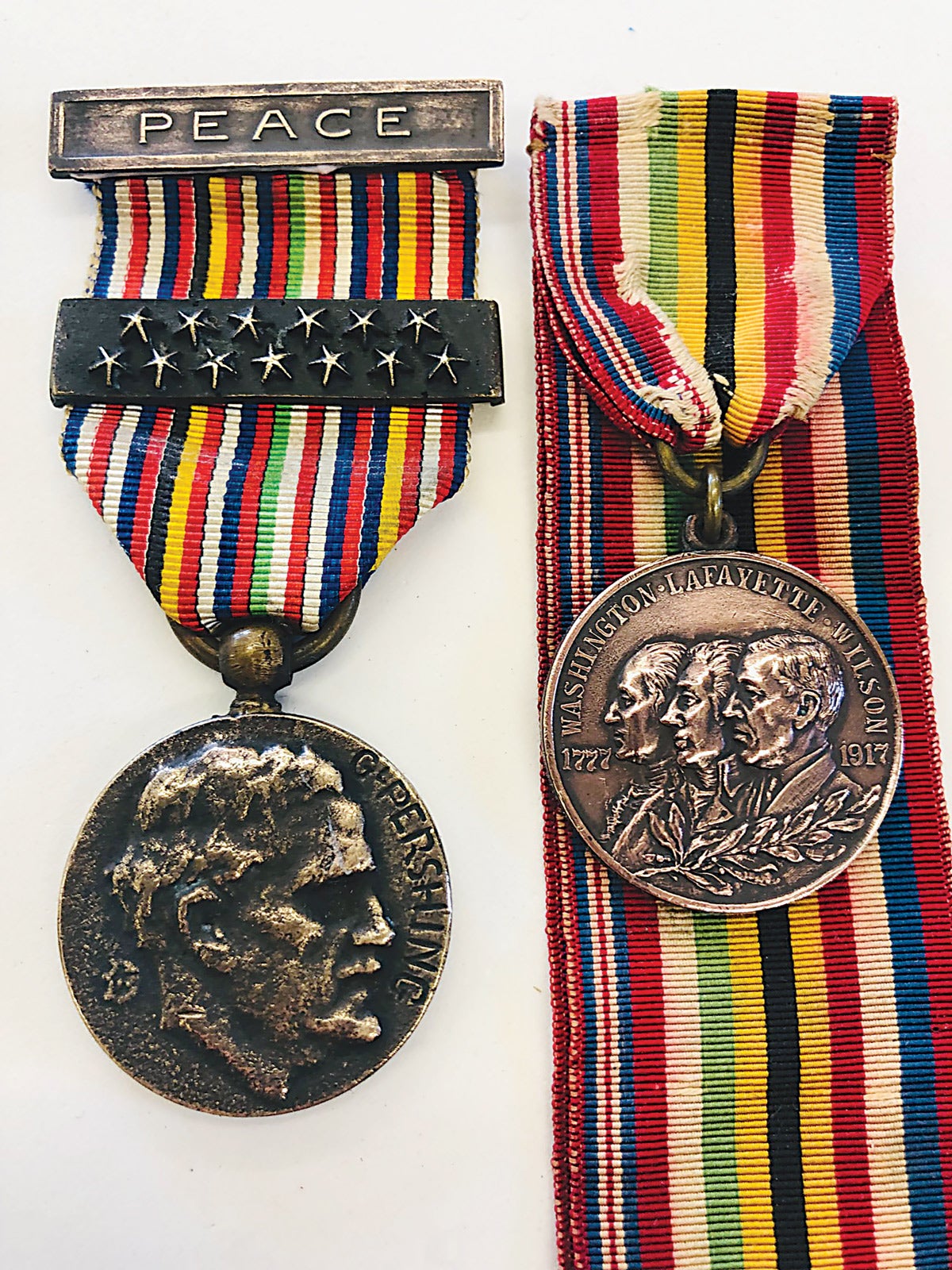The Pershing 48 Stars Victory Peace Medal was designed by Pierre Roche.