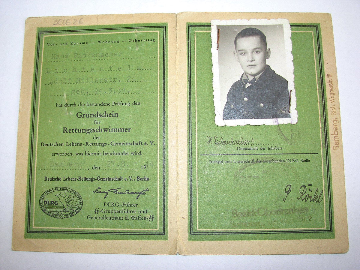 13-year-old Hitler Youth member Hans Fickenscher received his DLRG membership ausweis in August, 1944. The membership book has a facsimile signature of a DLRG leader who is also an SS General Officer.