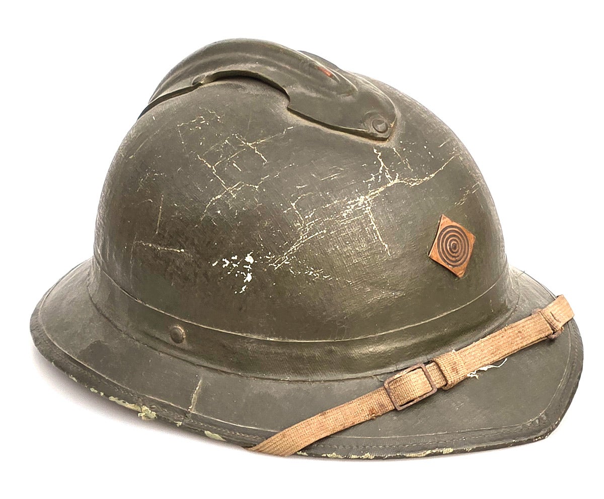 The Brazilian fiber helmets were produced domestically and influenced by the French Model 1915 “Adrian” helmet.