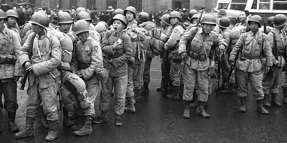NRA troops in marching drills at the Chinese Military Academy in Chengtu in 1944, highlighting that even late in World War II, the German M35 helmet was still in use.