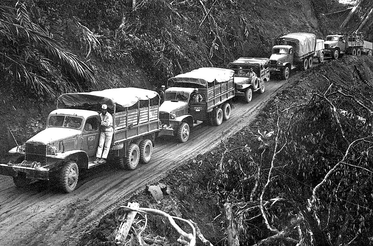 The majority of U.S. MVs that drove the road were apparently GMC CCKWs, if one judges from photos. Note also the Dodge WC51. These, along with the Dodge WC54 ambulance, are frequently seen in WWII Burma Road photos.