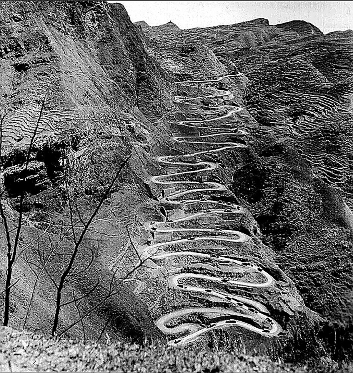 Considering the equipment available at the time and the urgent need to get the job done, the Burma Road was a marvel of mid-20th-century engineering. The road ran through a mountain range several thousand feet tall, which required removal of 100,000 cubic feet of earth for every mile constructed. All this work was accomplished by 15,000 American soldiers and 35,0000 locals. This section of the road is still in use.