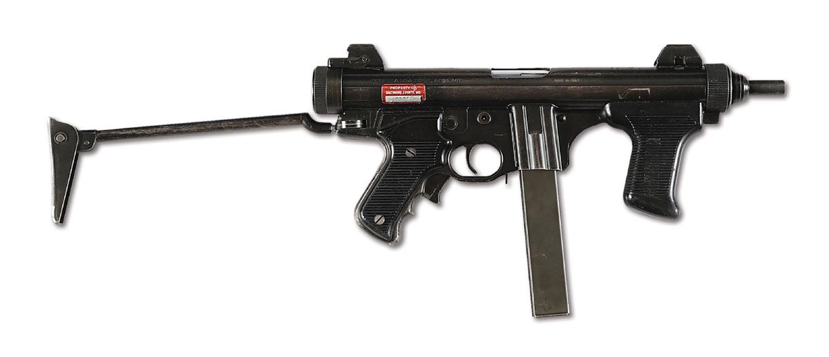 Exceptionally rare Fully Transferable Beretta Model PM12S machine gun, 9mm Luger, from the ‘12’ Series. Retains original law enforcement sticker that reads ‘Property of Baltimore County, MD,’ with a property number. Fully transferable. One original 40-round magazine included.