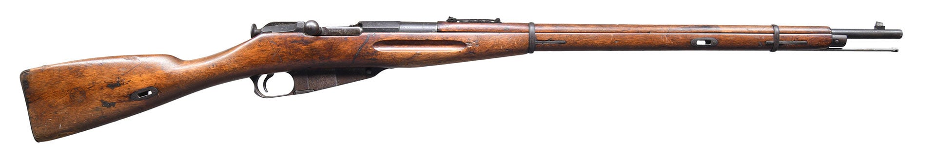 Lot #1243, an early pattern Mosin Nagant Dragoon bolt action rifle, was estimated at $700-1,000 and sold for $5,750.  