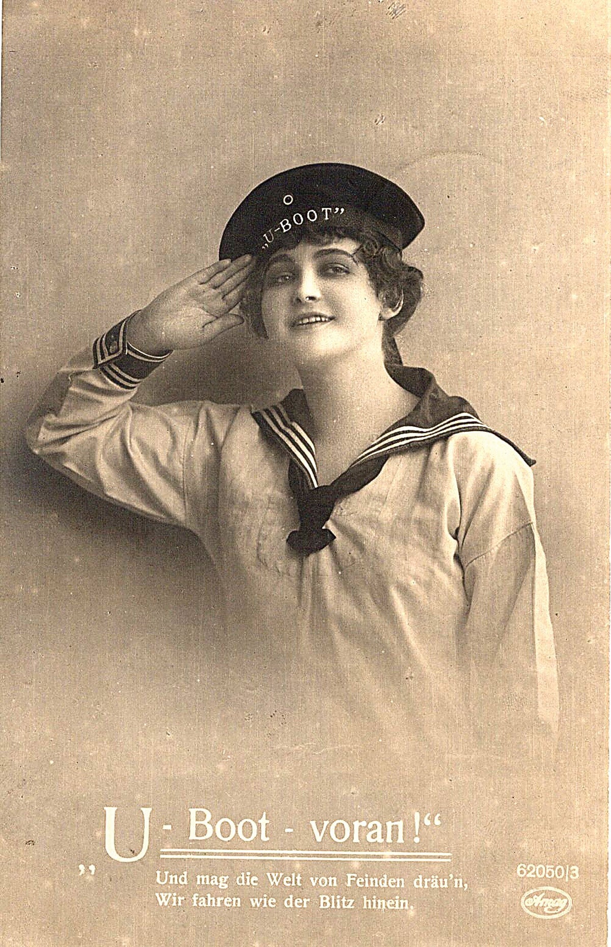 A WW1 German beauty salutes on this patriotic naval postcard bearing the title “U-Boot Voran” (Submarine forward!).