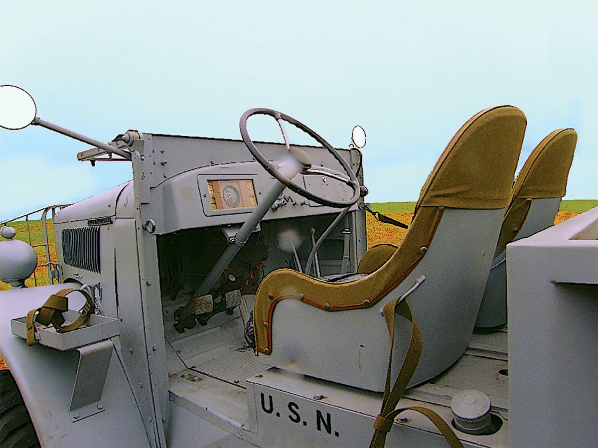 Built primarily for the U.S. Marine Corps, which seemed to disdain frills such as cabs or even body-tubs — or perhaps wanting to provide fast egress for the driver should the vehicle come under enemy fire — the M-1-4 and M-2-4 cargo trucks, when viewed from the side, looked like stripped-down somethings a farm boy might make.