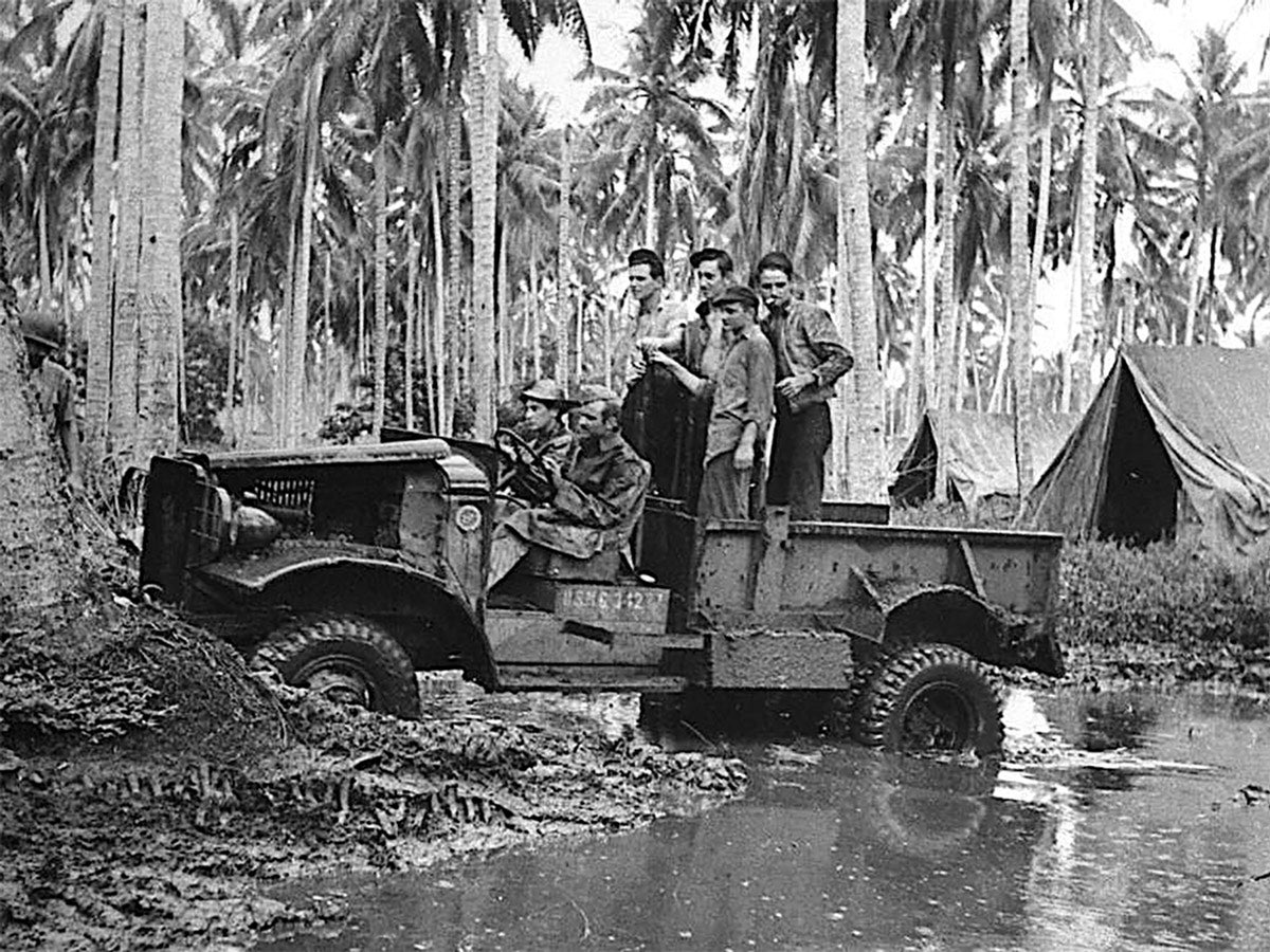 Approximately 10,450 M-2-4 trucks were built by IHC, with most of them going to the Marines and used in the Pacific. Some closed-cab models were built for the Navy, and some later production models were fitted with 12-volt electrical systems. Some ambulance-bodied models were also built on this chassis. Many were field-fitted with dual rear wheels for obvious reasons, as shown in this photo.