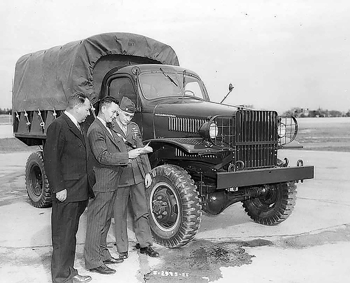 A first production M-3-4 1 1/2-ton cargo truck. Note the gloss paint and advertising for IHC on the side of the hood.