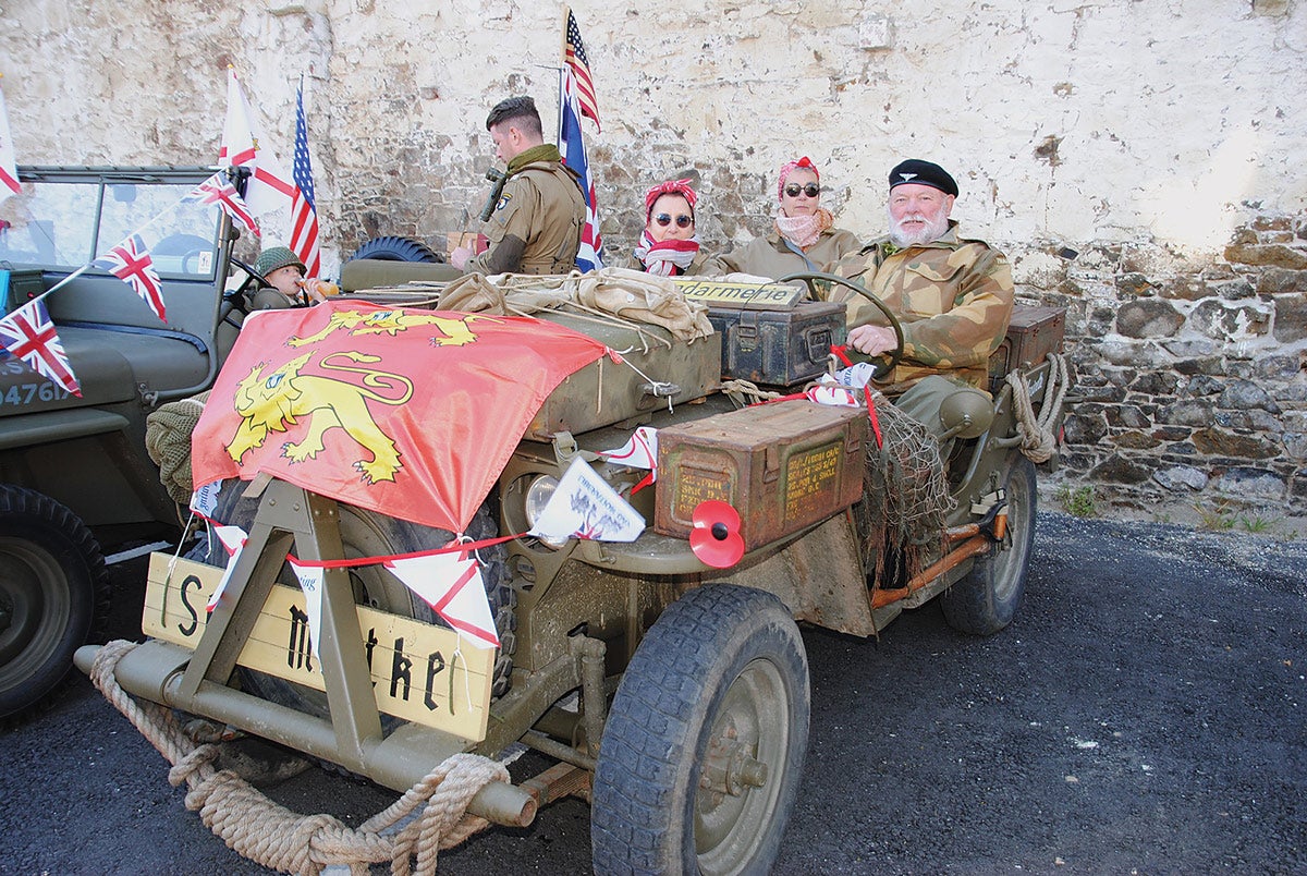 French friends Aupinel, Cristophe and Isobel came from Granville driving this ‘hybrid’ Jeep to take part in the celebrations. The front portion is a Willys welded to the rear portion of a Ford.