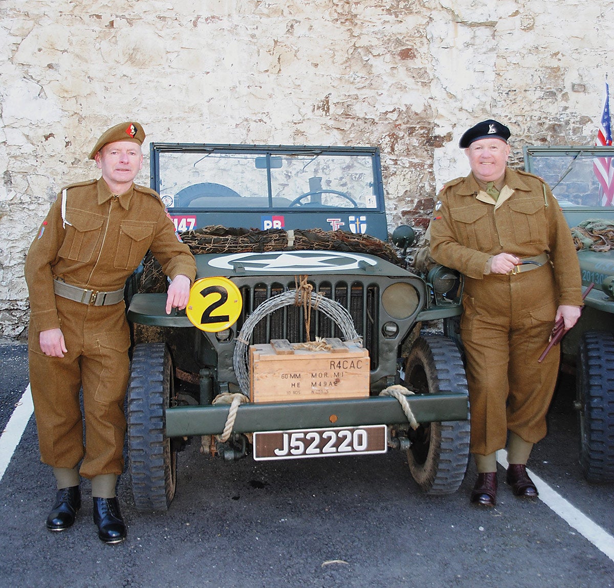 Ricky LeQuesne, right, standing by his 1942 Willys with his friend Adrian Channing. It is shown in the markings of 50 (Northumbrian) Division, sometimes known as “Tyne Tees”, part of the British 21st Army Group commanded by General Montgomery.