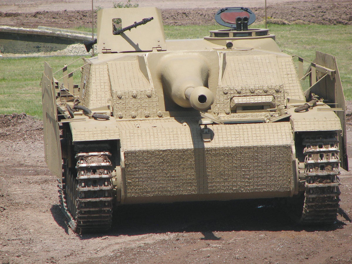 It has a compact design with a low silhouette, plus additional track plates for extra protection.