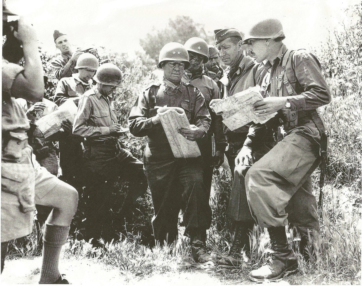 Commanding Officer of the 1st SSF Colonel Robert T. Frederick (far right) during the breakout from
Anzio and drive to Rome May-June 1944. To Frederick’s right are General Mark Clark and Major General Geoffrey Keyes. 