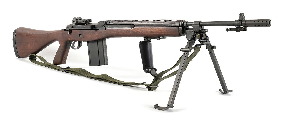 exceptional condition with original TRW-marked bolt. Top of receiver stamped ‘U.S. RIFLE/ 7.65MM M14’ over TRW triangular logo above serial number ‘612891.’ Highly desirable walnut U.S.G.I. E2 stock with pistol grip, bipod, original sling, sling loop, muzzle brake, and one magazine. Conveyed with additional standard U.S.G.I. original buttstock with proper Dept. of Defense eagle-and-stars marking. Sold for $88,560 against an estimate of $35,000-$50,000