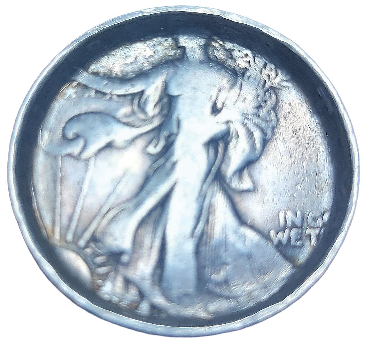 A peek inside this ring discloses it’s source: a British 1930s era silver 2 shilling piece. This 1941 Walker began to transition to a ring, but the job was never finished.