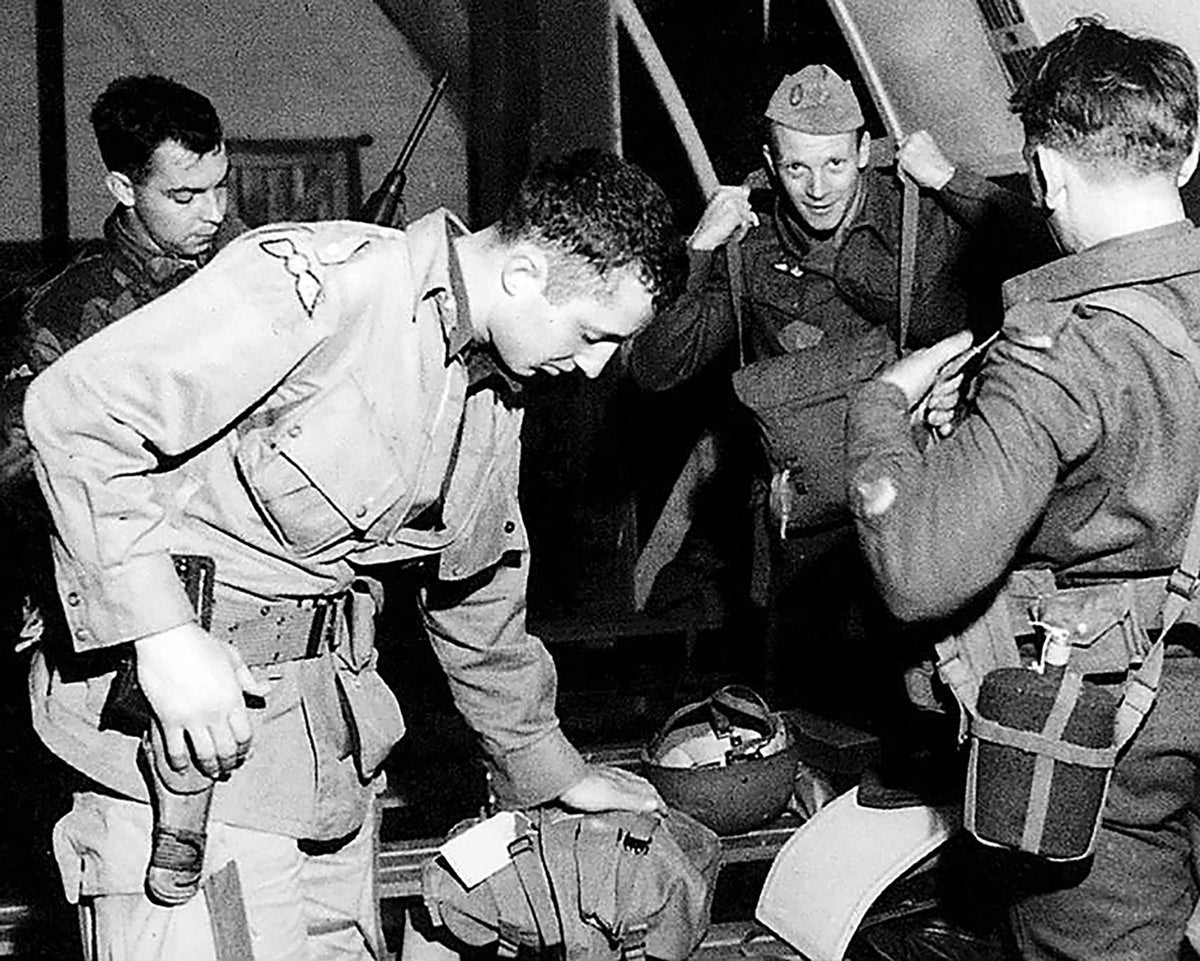 A SFHQ Jedburgh team preparing for their mission.