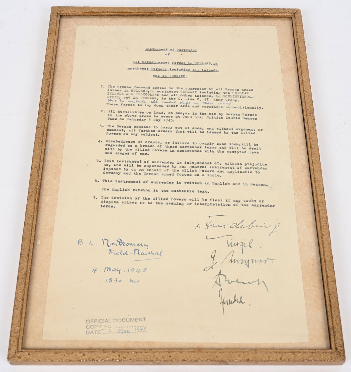 Signed copy of World War II ‘Instrument of Surrender of all German armed forces in Holland, in North West Germany including all Islands and in Denmark.’ Hand-signed by British Field Marshal Montgomery and five Generals of the German High Command: Hans Georg von Friedberg, (Eberhard) Kinzel, G. (Gustav) Wagner, (Fritz) Poleck and (Hans Jochen) Friedel. Stamped at lower left ‘OFFICIAL DOCUMENT / COPY No / DATE 4 May 1945.’ Eight copies of this document are known to exist, perhaps more. Excellent condition.