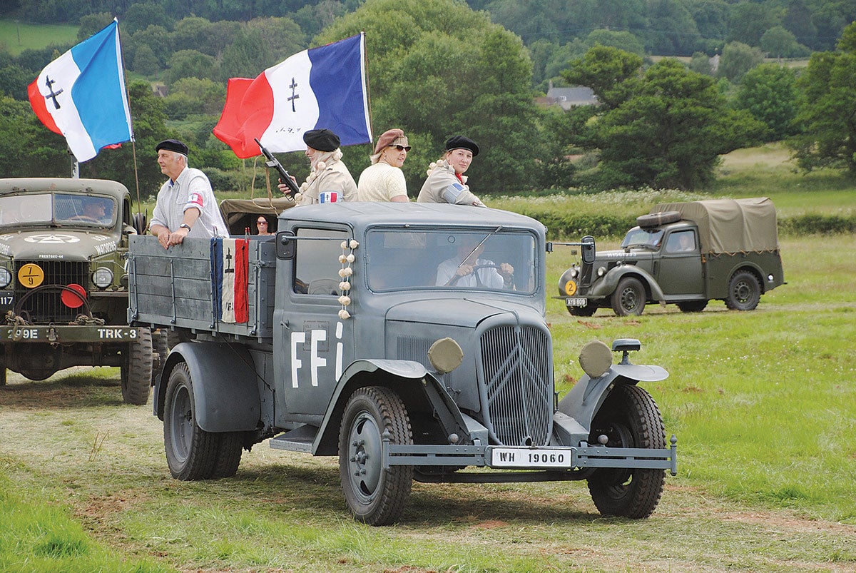 A French U23 — standing for 2.3 tons. The truck was produced for the German Army by Ciroen. This example is in the colors of the FFI after the Liberation of Paris.