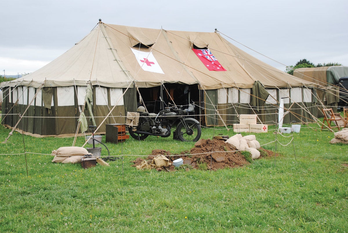Chris and Vicki’s Australian Army hospital tent complete with a range of items on display, including a stirrup pump should a fire break out