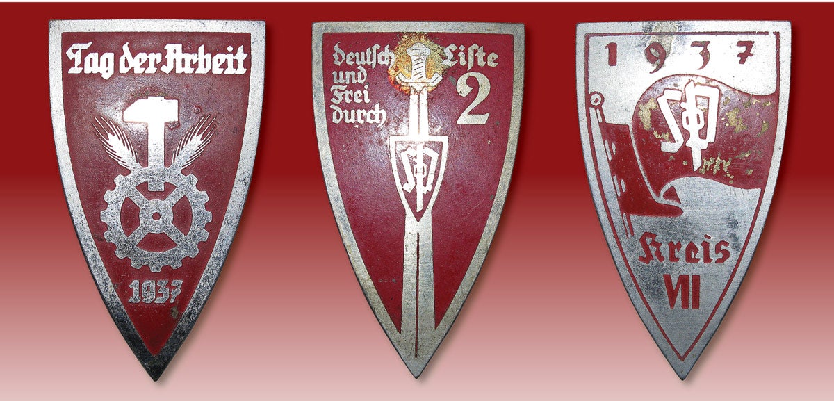 1937 SDP rally badges with patriotic and work celebratory themes.