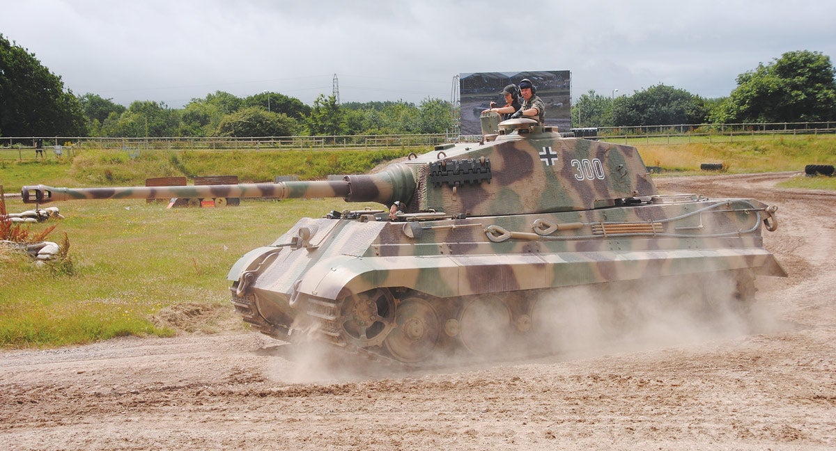 The King Tiger is all about power, including the long barrel, the King Tiger measured over 33 feet in length. Taking part in the battle re-enactment scenario at Tankfest in Dorset, England, it overshadowed all the Allied tanks.