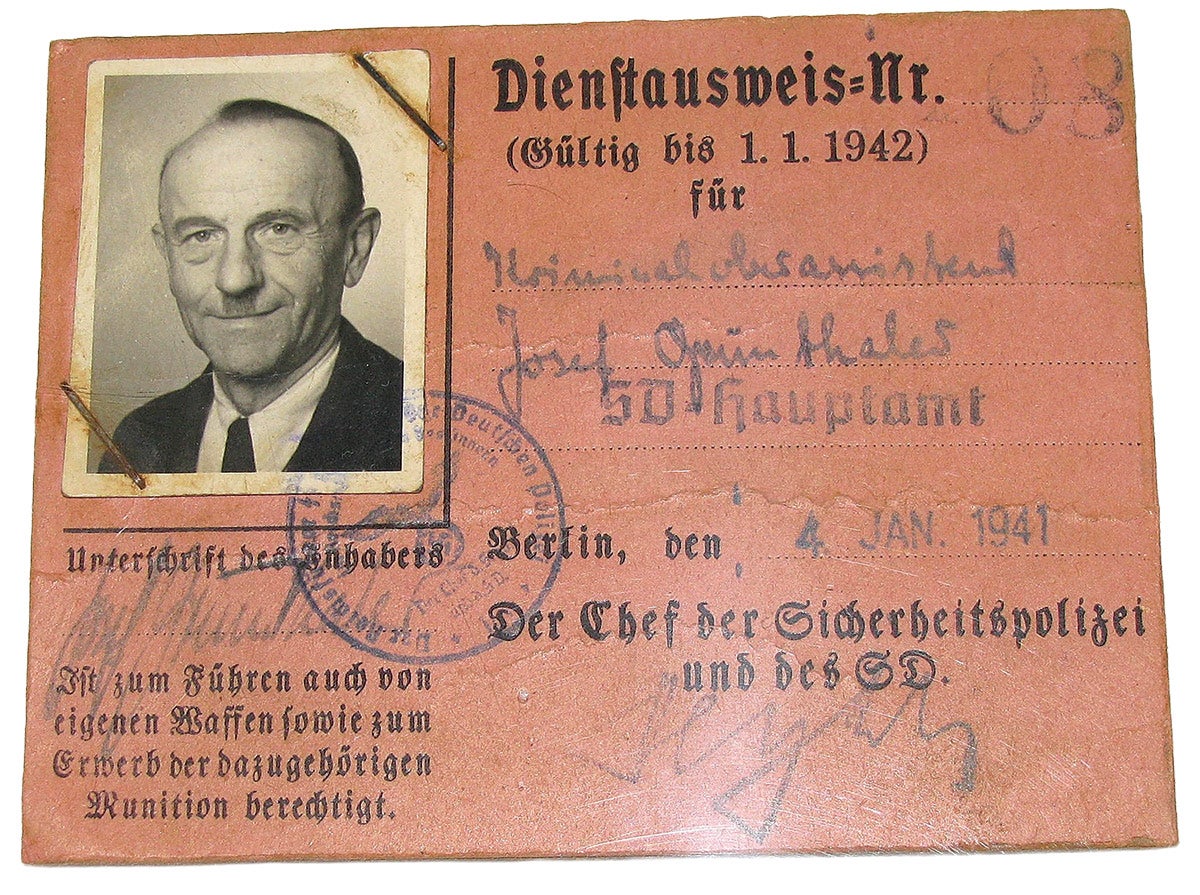 An SD service ausweis for Josef Thales, with an auto-pen Heydrich signature on the bottom.
