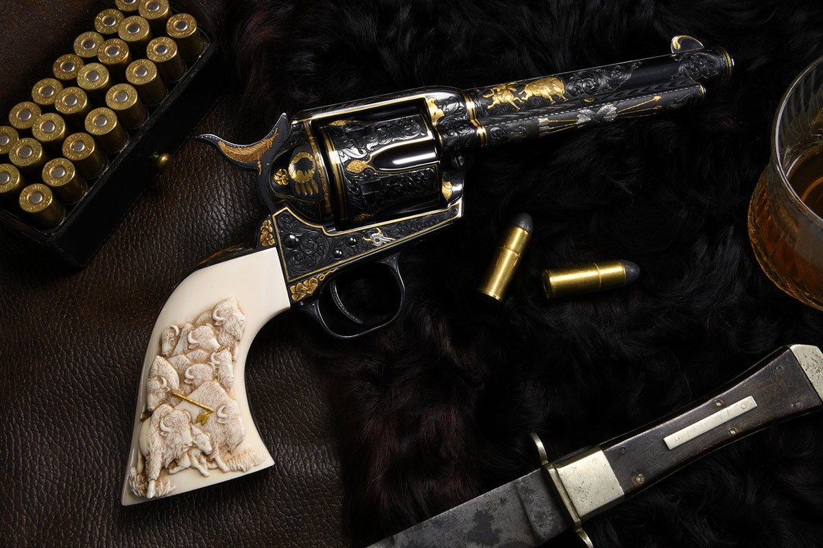 Lot #3316, an engraved and inlaid SAA Colt by master engraver Michael Dubber, was estimated at $14,000-18,000 and sold for $30,500.