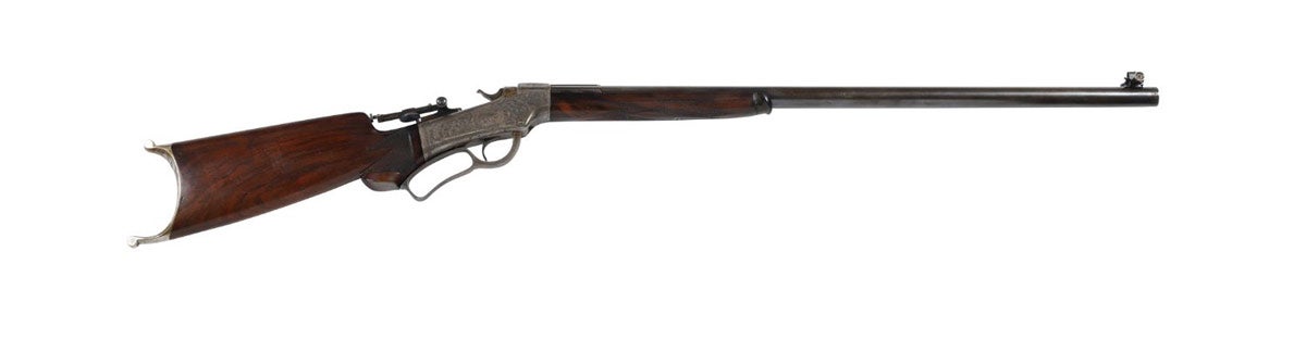 Lot 124: American circa 1880-1882 J.M. Marlin 6 ½ Rigby off-hand mid-range target rifle. The .38-.55 caliber, single-shot rifle had a factory engraving that depicted game scenes (CA$6,490)