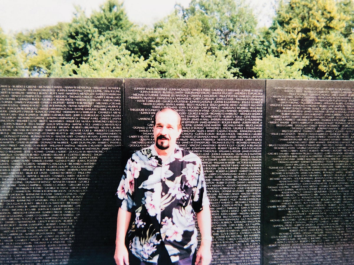 Mark Sutton at the Vietnam Memorial in Washington D.C. years after his service.