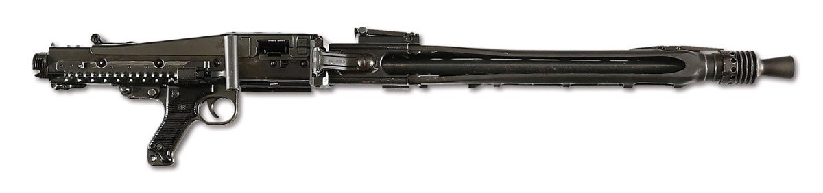 Very early German Rheinmetal Model MG42/59 machine gun imported and registered by Cadillac Gage (Warren, Michigan) and used to bore-sight vehicle turrets. Scarce configuration with 20in-barrel, factory-correct 7.62x51mm (.308) NATO caliber/bore using M13 disintegrating links. Very low serial number 61-00001. Left side of receiver, forward of factory markings, marked “RHEINMETAL GmbH/FRG CADILLAC GAGE WARREN, MICH” in electro-pencil. The first of the MG42/59s. NFA item requiring BATF approval prior to transfer to new owner.