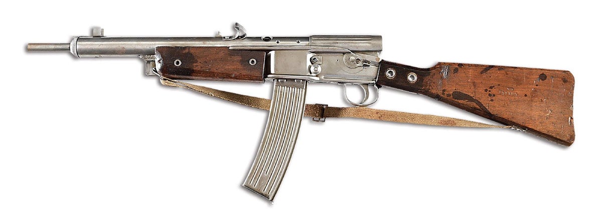 Rare late-WWII Gustloff-Werke Volkssturmgewehr 8mm Kurz semi-automatic rifle used primarily by German conscripts pressed into service as a final line of defense. Documented and illustrated in Weaver’s ‘Desperate Measures’ book. Approximately 10,000 manufactured under contract for the Volkssturm, but few have survived. Barrel tastefully extended several inches (to 16¼in) to meet US import requirements. Very scarce German last-ditch assault rifle.