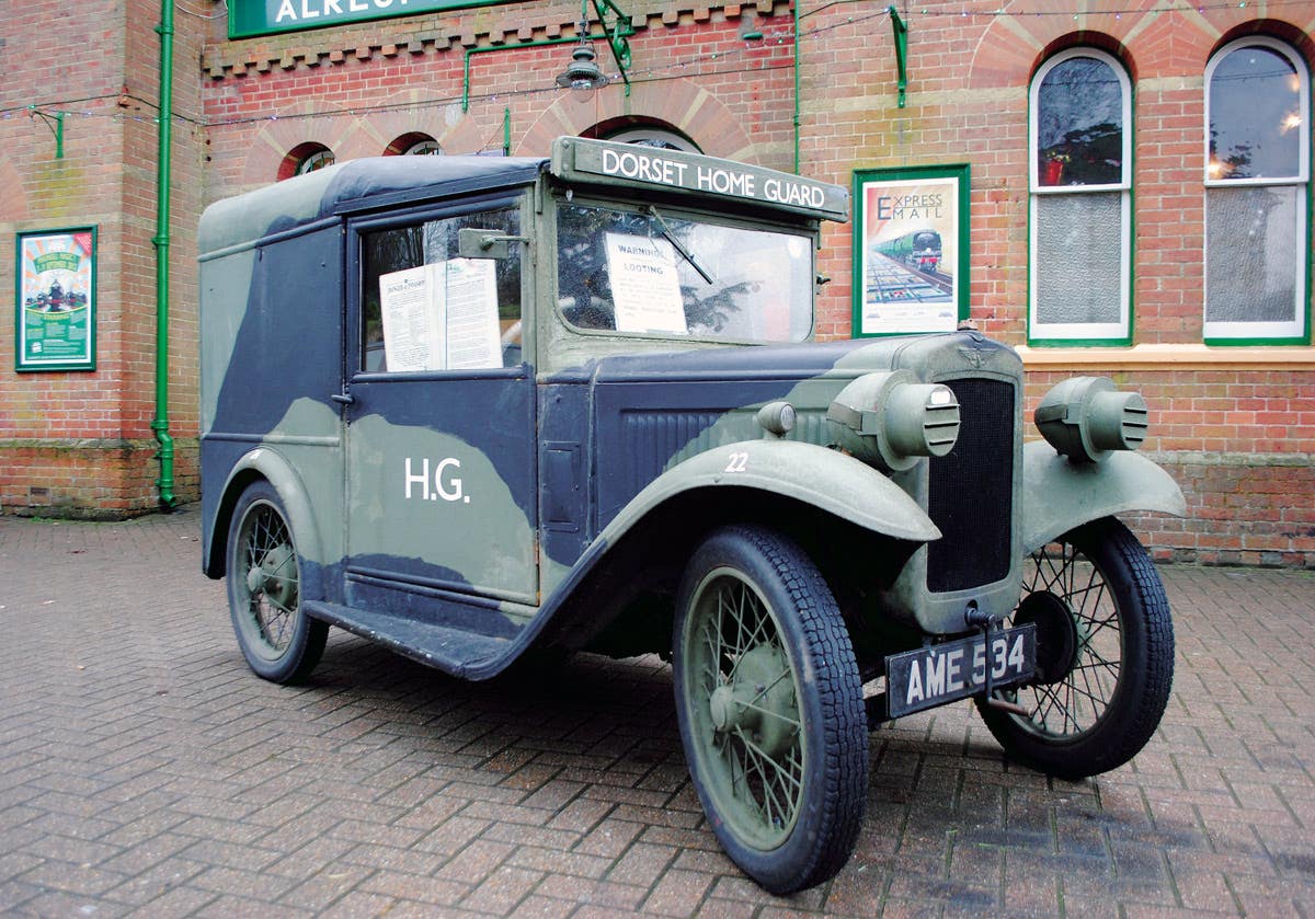 Dale Johnson’s Austin 7 van in its basic scheme marked as a Home Guard vehicle. Original features from the 1930s are evident, such as the starting handle, headlamp covers for the Blackout and wire-spoked wheels.