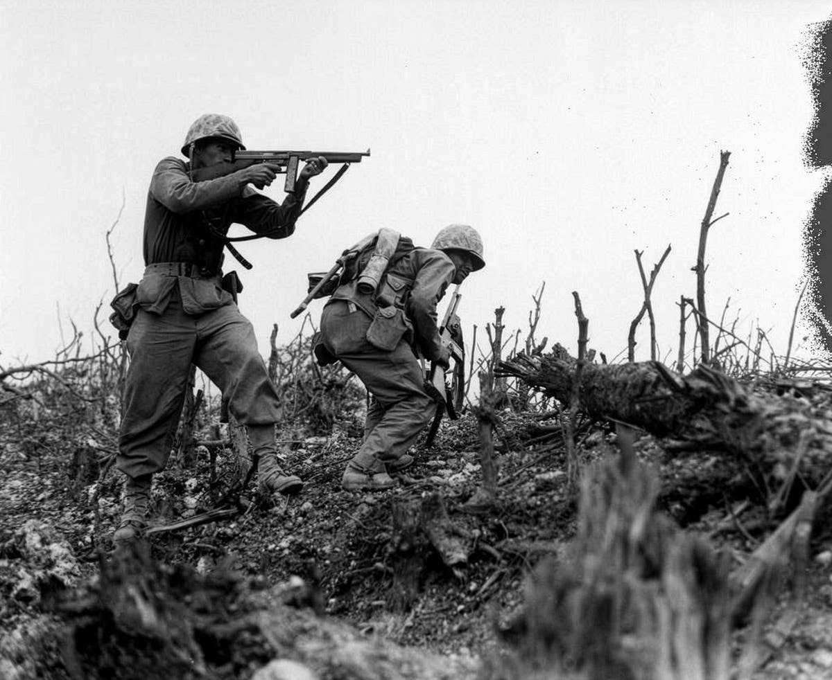 Soldiers of the 1st Marine Division work through Japanese strong points to take Wana Ridge on Okinawa.
