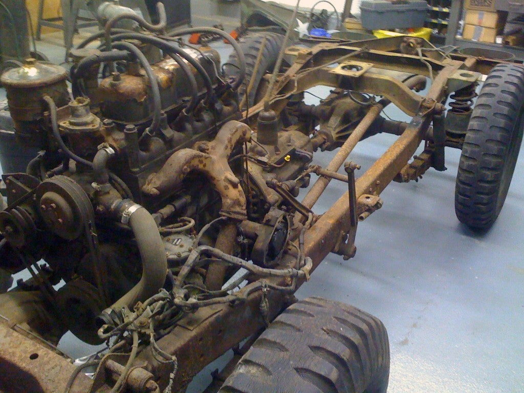 once-in-the-shop-angelo-removed-the-tub-and-began-work-on-the-frame-and-engine-the-4-cylinder-engine-received-new-pistons-rings-and-bearings.jpg