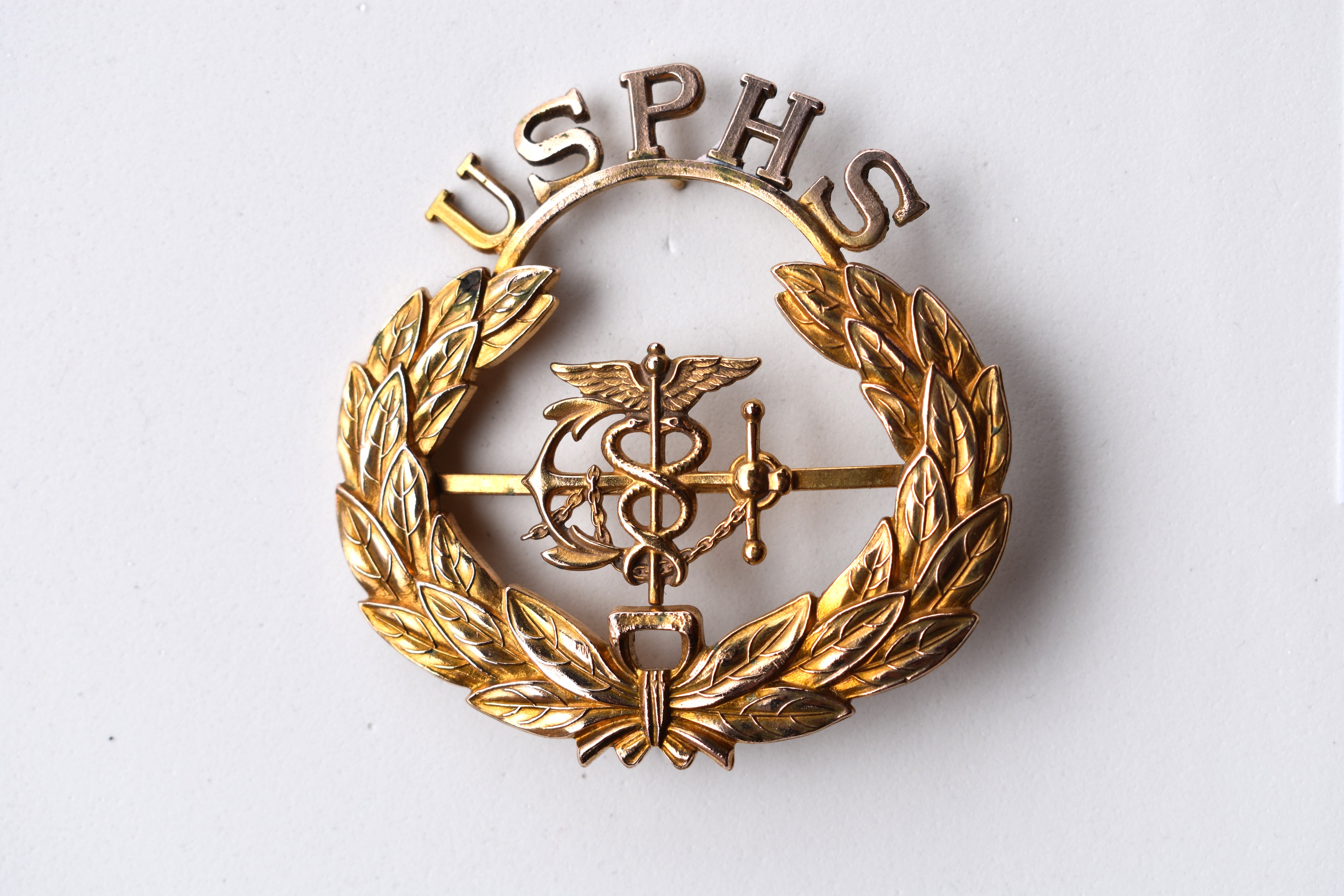 fig-3--phs-_-vintage-early-cap-badge.jpg