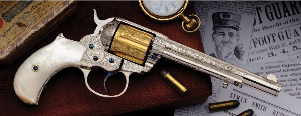 officer-lyman-smiths-engraved-gold-plated-colt-1877-lightning.jpg
